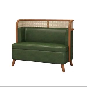 Green upholstered commercial booth seating with natural wood frame and cane back for restaurants and hotels.