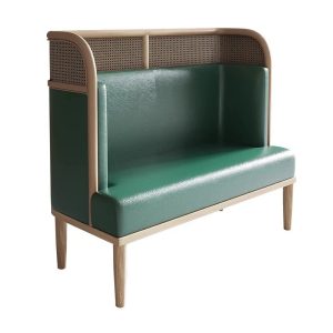 Green leatherette and natural wood booth seating with cane webbing back for restaurant dining