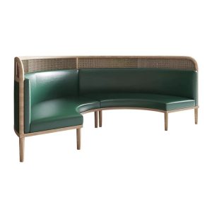 Curved commercial booth seating with green upholstery, light wood frame, and cane back for hospitality settings.