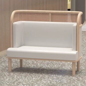 Modern wood and cane banquette with off-white upholstery for restaurant dining area