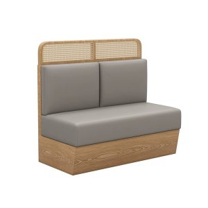 Grey upholstered cane back booth seating with wooden base