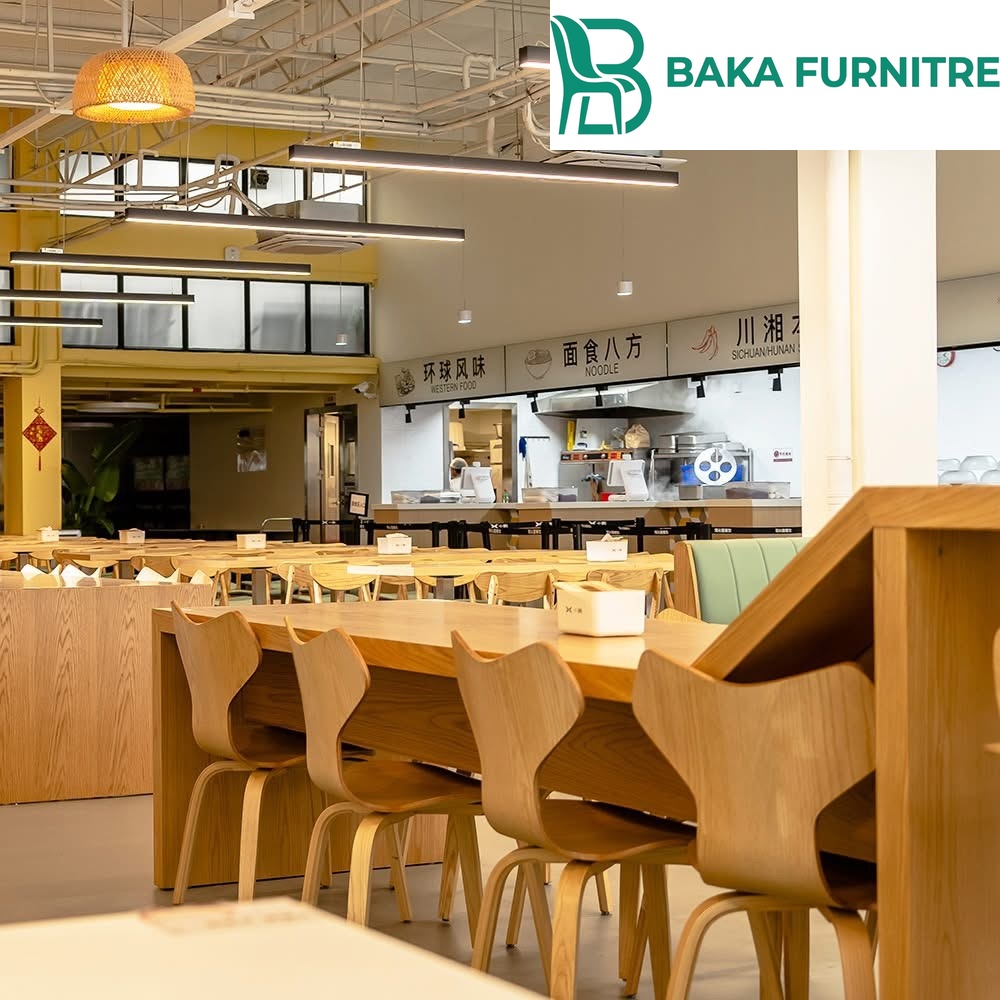 Commercial restaurant interior featuring warm earth tone booth seating and wood dining tables