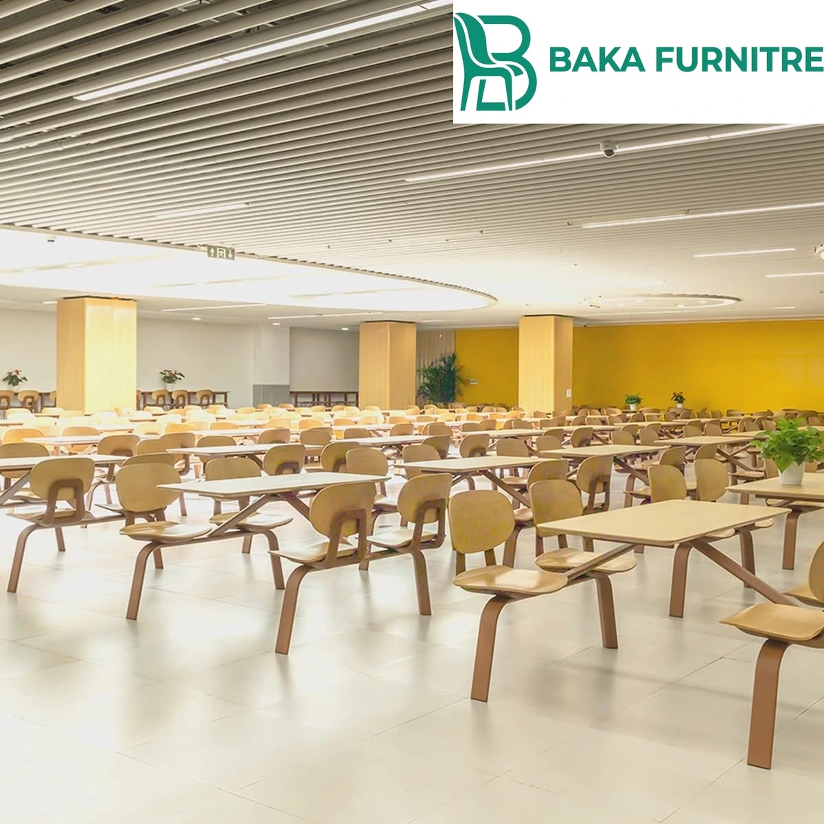 Counter-height stools and narrow wall tables in a cafeteria perimeter seating zone, project view 2